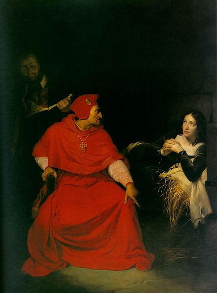 Joan of Arc is interrogated by The Cardinal of Winchester in her prison.